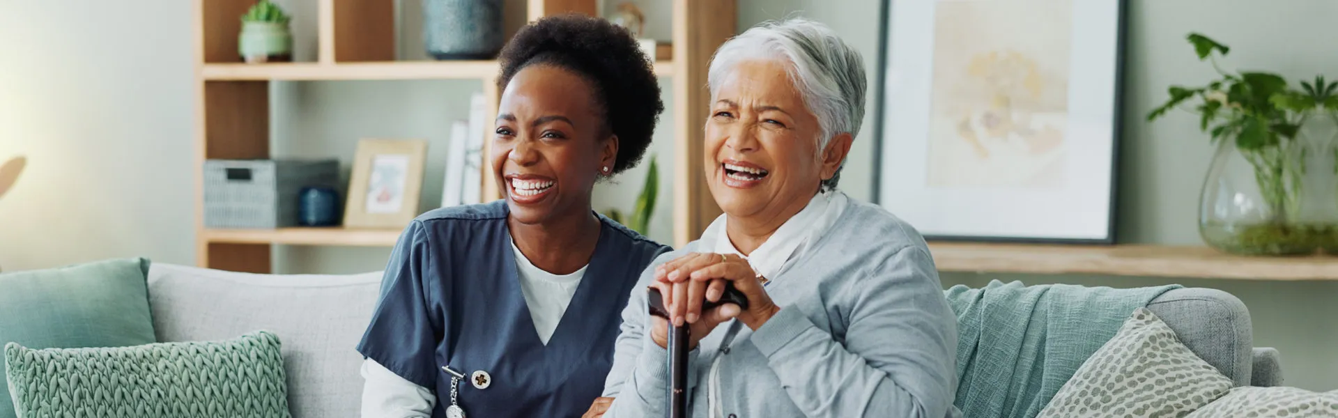 caregiver and senior smiling