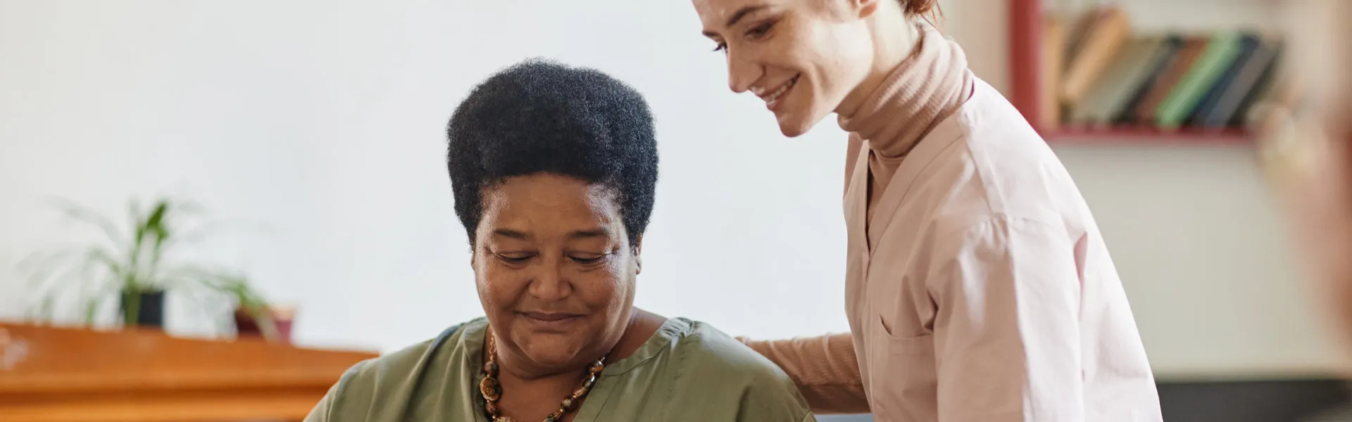 caregiver taking care of senior