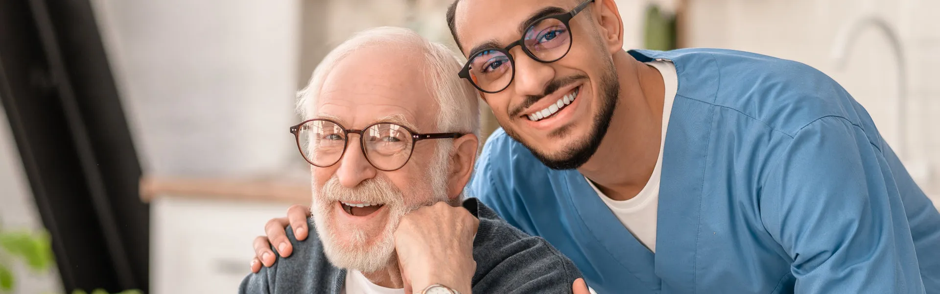 senior and caregiver smiling